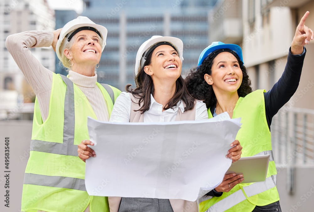 Poster Watching their plan unfold. Cropped shot of three attractive female engineers reading a blueprint while working on a construction site.