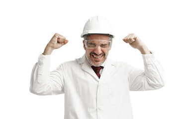 Caucasian middle age man wearing protective eye glasses and hardhat with white gown suit raised his...