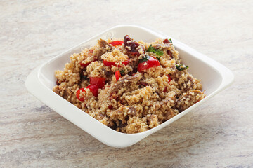 Arabic cous cous with meat and tomato