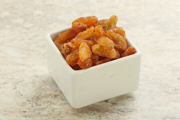 Sweet yellow raisin in the bowl