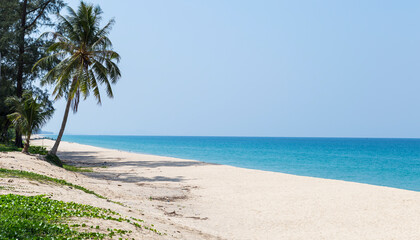 White sandy beach with blue sea background, summer beach, tropical island, vacation destination to south of Thailand