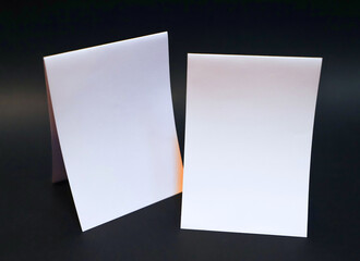 A4 A6 A5 Tent Fold Top Fold blank flyer mockup on black background.