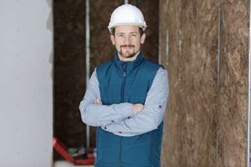 portrait of man with insulate wall in the background