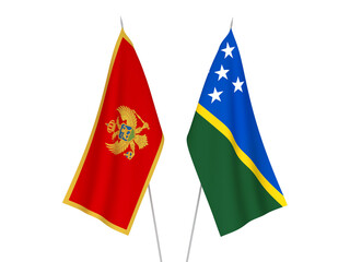 National fabric flags of Montenegro and Solomon Islands isolated on white background. 3d rendering illustration.