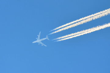 Four engine airplane in the sky