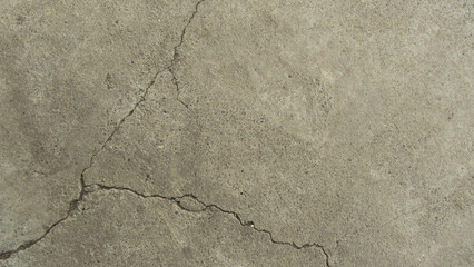 old cracked concrete. Grunge concrete cement wall with crack, for your design and background texture. stone walkway. concrete texture