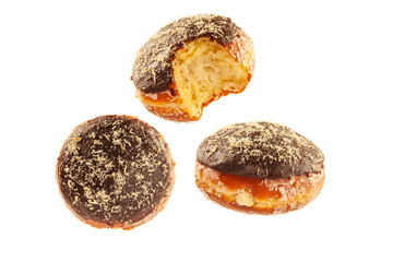 chocolate coconut brioche doughnuts in different angles with chocolate frosting