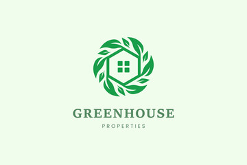Home and leaf tree logo template for property or real estate business