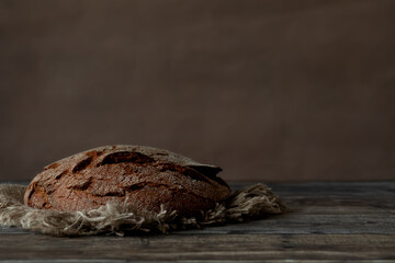Loaf on a wooden background