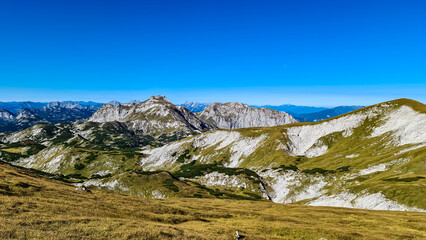 Panoramic view on the mountain peaks of the Hochschwab Region in Upper Styria, Austria. Sharp summits of Ebenstein and Hinterer Polster, Alps in Europe. Climbing tourism, wilderness. Concept freedom