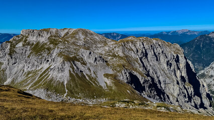 Panoramic view on the mountain peaks of the Hochschwab Region in Upper Styria, Austria. Sharp summits of Ebenstein and Hinterer Polster, Alps in Europe.Tourism, wilderness. Concept freedom. Limestone