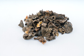 Dried Amla Whole Indian Gooseberry Herb over isloated white background