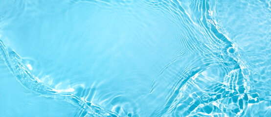 Transparent blue clear water wave surface texture with splashes and bubbles. Abstract summer banner...