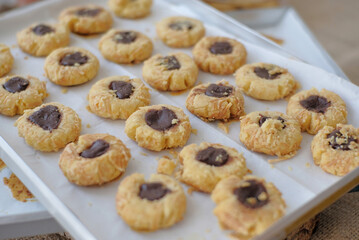 chocolate thumbprint cookies in the pan