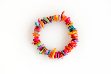 Top View of a Colorful Freshwater Shell Chip Bracelet Isolated on White     