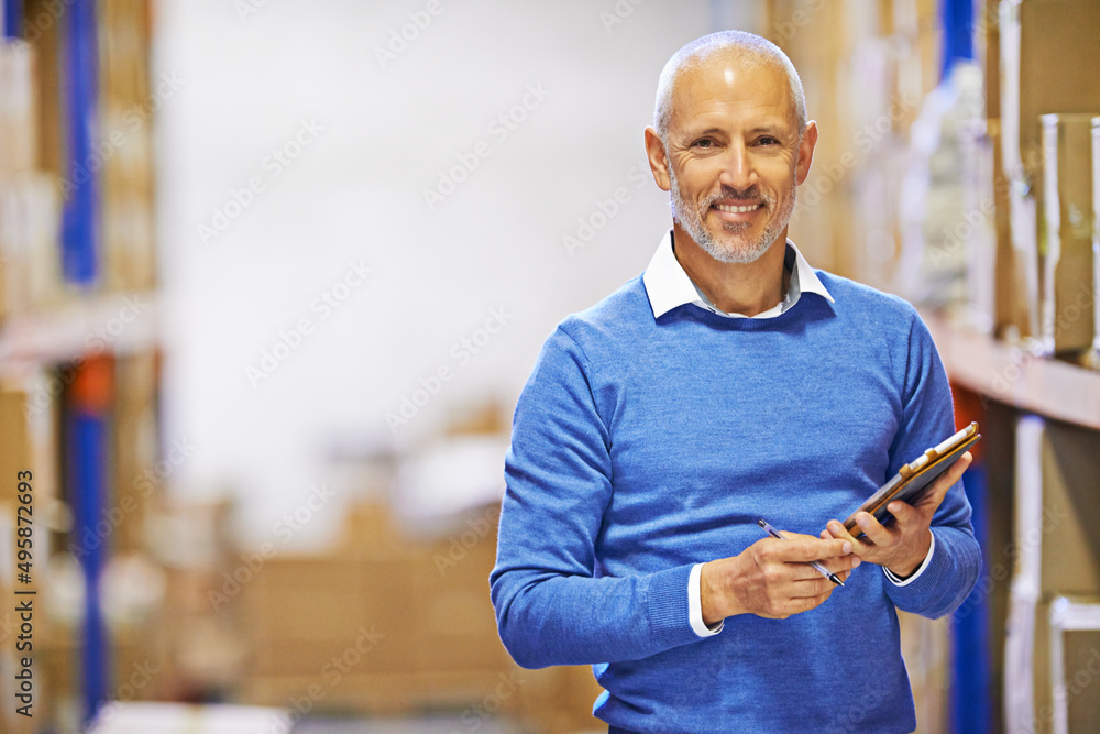 Canvas Prints Your order was shipped yesterday. Portrait of a mature man working inside in a distribution warehouse.