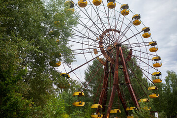 Old abandoned Ferris wheel in the amusement park in the ghost town Pripyat Ukraine. Chernobyl...
