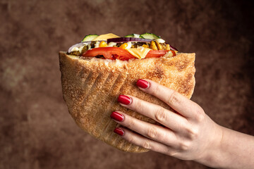Kebab, pita, gyros, shaurma, wrap sandwich stuffed with sausages from minced meat with grilled...
