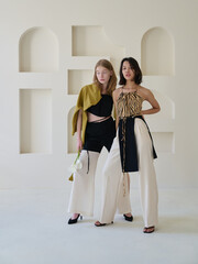 fashion shooting in studio . professional model of blonde, fashionable clothes and style, new collection. stylish look.