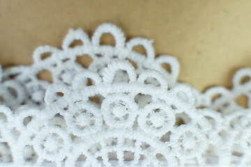 White brocade background, White Prayer hijab brocade detail. Beautiful fabric with fashionable motifs