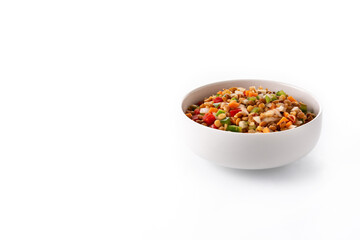 Lentil salad with peppers,onion and carrot in a bowl isolated on white background. Copy space