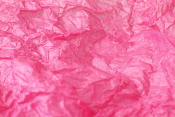 Fototapeta premium Pink wrinkled paper background