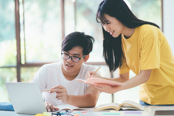 Young students campus helps friend catching up and learning.