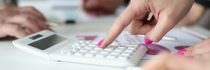 Female accountant busy with counting