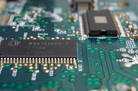 Sochi, Russia - March 28 2022:Winbond Electronics Corporation, Taiwan-based corporation products on pcb. It produces semiconductors and integrated circuits, personal computer ICs, Super IO chips