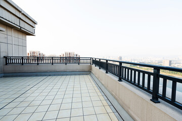 Rooftop balcony with sky background