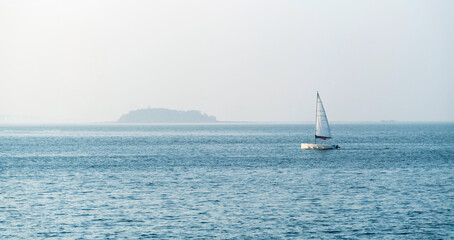 Fototapeta premium Sailboat in the sea background