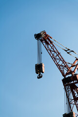 Naklejka premium Looking crane working from below
