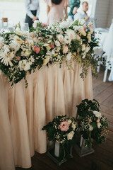 Decoration for party. Tables set for an event party or wedding reception. Luxury elegant table setting dinner in a restaurant. Glasses and dishes.