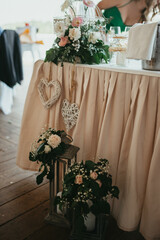 Decoration for party. Tables set for an event party or wedding reception. Luxury elegant table setting dinner in a restaurant. Glasses and dishes.