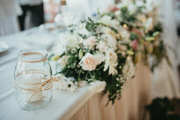 Decoration for party. Tables set for an event party or wedding reception. Luxury elegant table setting dinner in a restaurant. Glasses and dishes.