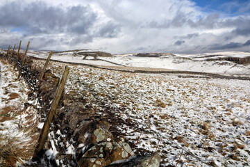 Snow and a drystone wall in the Yorkshire Dales