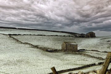 Barns and walls in winter in the Yorkshire Dales