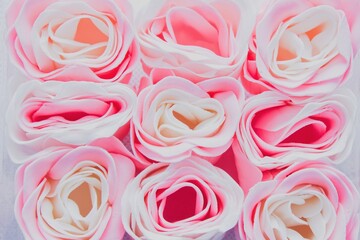Nine pink-white soap buds of roses.Beautiful soap composed of petals. Like a real rose. White-pink combination.