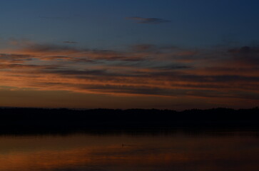 Beautiful sunset reflected in the lake.