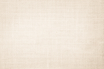 Jute hessian sackcloth burlap canvas woven texture background pattern in light beige cream brown color blank.