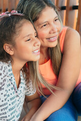 Portrait of mother with her little daughter