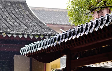 Washable wall murals Old building Rain falling on the roof of Chinese traditional building