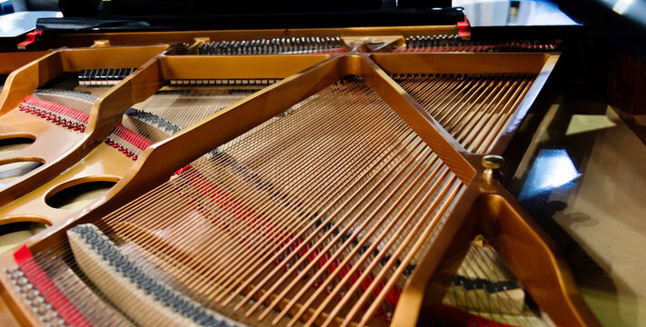 Close up of strings inside the piano