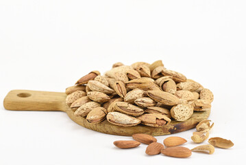 Almonds with wooden board