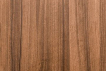 Brown wooden texture in chestnut color, table board or walnut floor with natural abstract plank pattern background