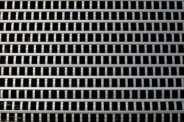 industrial storehouse with closed gray metal roller shutter