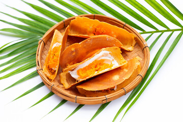Thai crispy pancakes on white background.