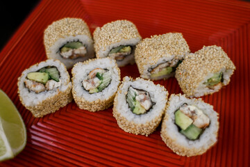 Philadelphia roll with salmon in sesame and white rice