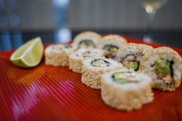 Philadelphia roll with salmon in sesame and white rice