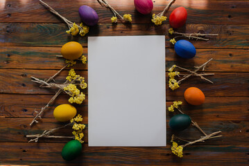 Easter eggs mocap on old wooden background